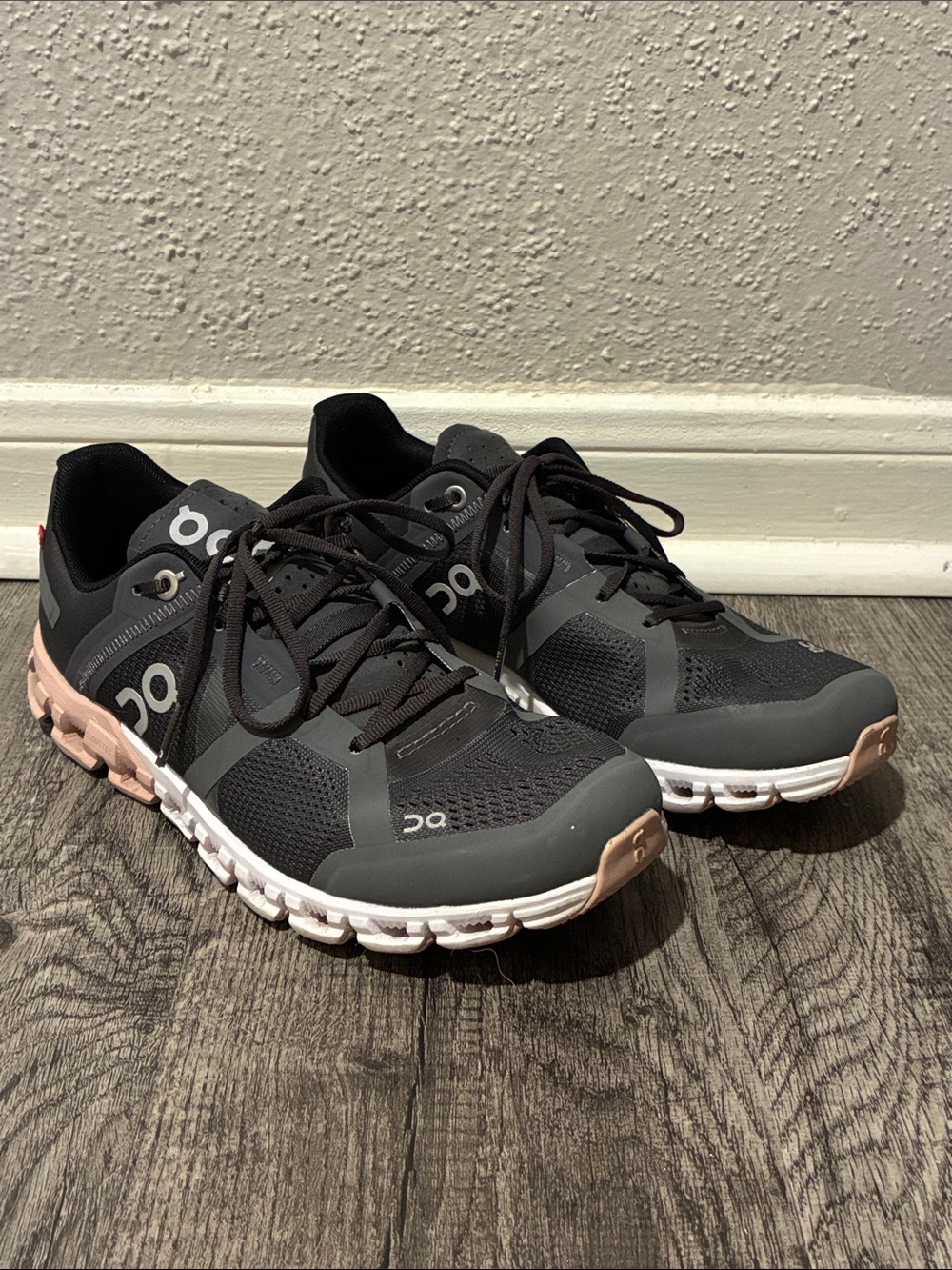 On Running Women’s Sneakers in Black with Gray and Pink Accents